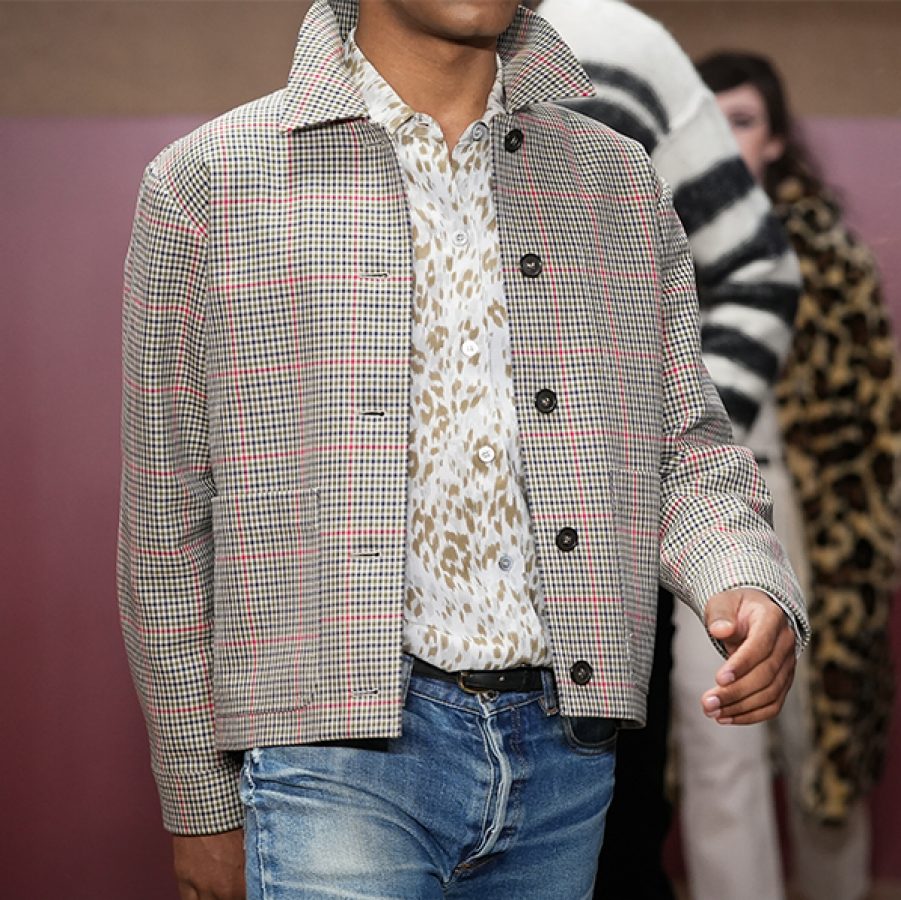 A male model walks the APC runway at Paris Fashion Week 2023